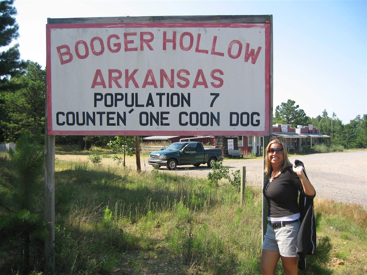 Mary at Booger Hollow Arkansas sign