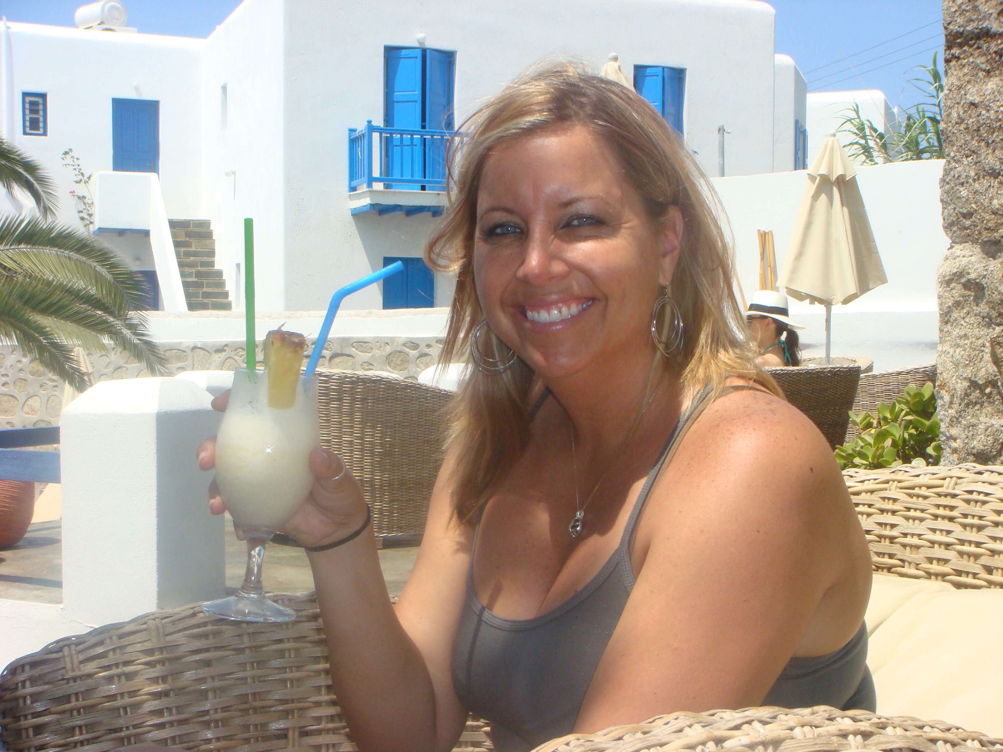 Mary with tropical cocktail in Mykonos